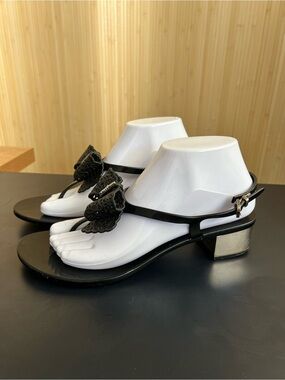 Salvatore Ferragamo Black Patent T-Strap Sandals with Floral Appliqué